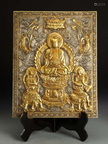 A CHINESE WHITE GILT BRONZE FIGURE OF BUDDHA SEATED