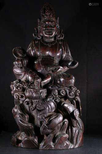 A CHINESE AGARWOOD FIGURE OF BUDDHA ORNAMENTS