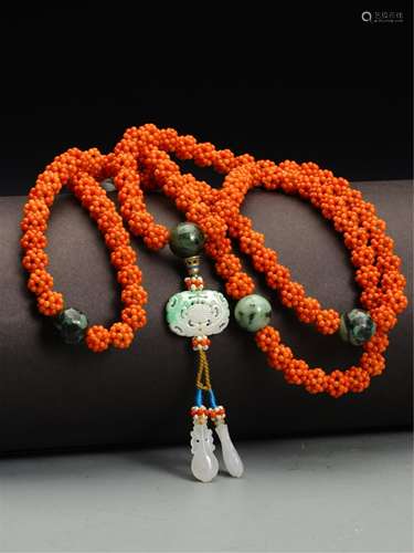 A CHINESE CORAL RICE BEADS HAND HELD ROSARY