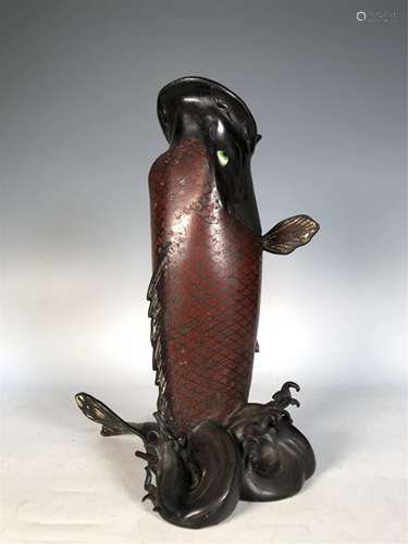 A BRONZE CLOISONNE FISH SHAPED FLOWER HOLDER