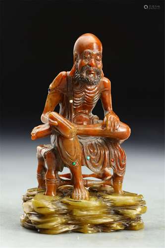 A CHINESE SHOUSHAN STONE LUOHAN SEATED STATUE