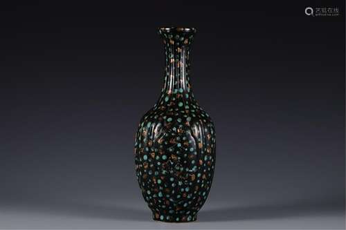 A CHINESE BRONZE GLAZED MELON SHAPED PORCELAIN VASE