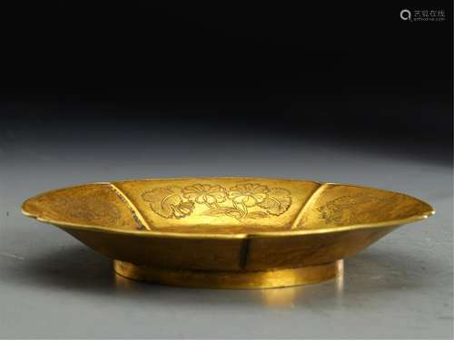 A CHINESE GILT BRONZE PLATE