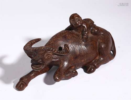 A CHINESE BOXWOOD CARVED BOY RIDING CATTLE ORNA…