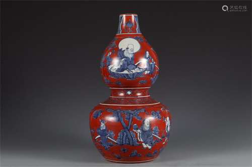 A CHINESE BLUE AND WHITE PORCELAIN DOUBLE-GOURDS VASE