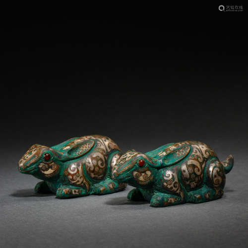 A PAIR OF BRONZE RABBITS INLAID WITH GOLD AND SILVER , THE W...