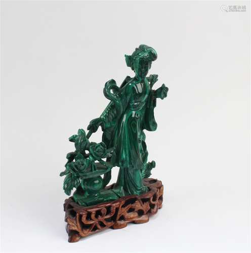 A Carved Malachite Figurine With stand