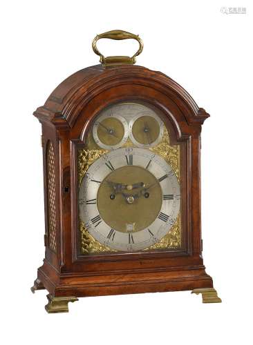 A GEORGE III FIGURED MAHOGANY TRIPLE PAD-TOP TABLE CLOCK