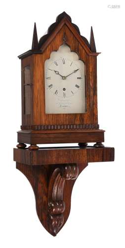 Y AN EARLY VICTORIAN ROSEWOOD SMALL GOTHIC BRACKET TIMEPIECE...