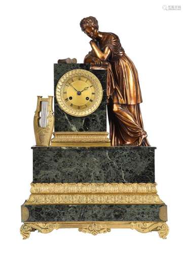 A FRENCH EMPIRE ORMOLU AND VERDE ANTICO MARBLE FIGURAL MANTE...