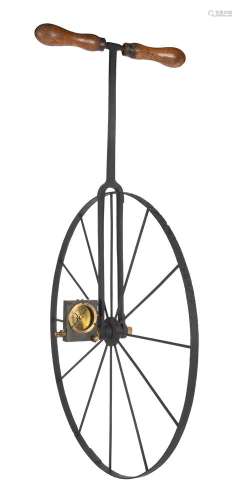 A RARE VICTORIAN WROUGHT IRON AND BRASS WAYWISER OR HODOMETE...