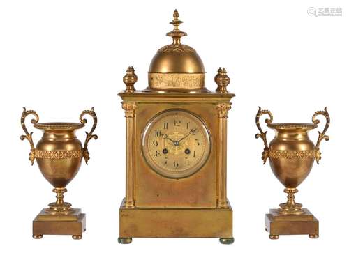 A FRENCH GILT BRASS MANTEL CLOCK GARNITURE