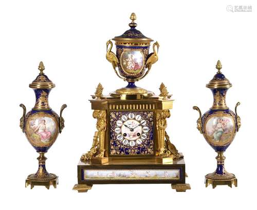 A FRENCH PORCELAIN INSET ORMOLU MANTEL CLOCK