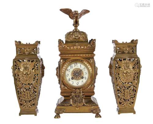 A FRENCH LACQUERED BRASS MANTEL CLOCK