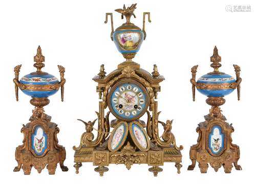 A FRENCH GILT METAL AND PORCELAIN MANTEL CLOCK