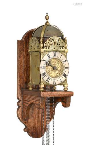 A BRASS LANTERN CLOCK