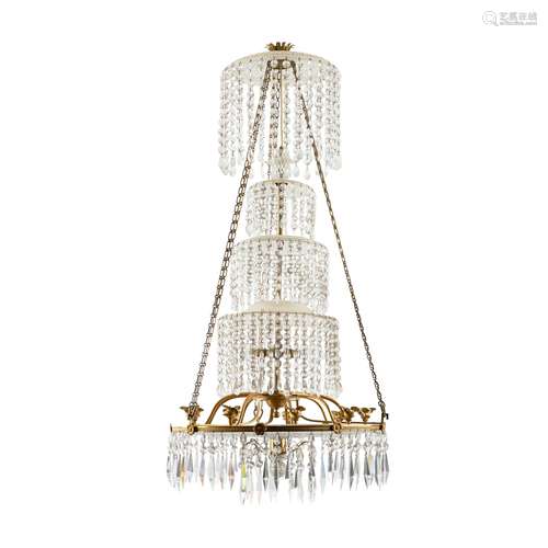 A REGENCY CUT GLASS AND GILT BRASS CASCADE CHANDELIER