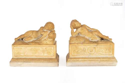 A Pair of Marble Models of Sleeping Cherubs on Plinths