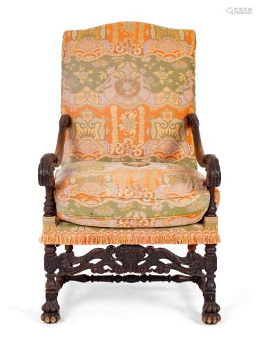 A Spanish Colonial Style Carved Walnut Open Armchair