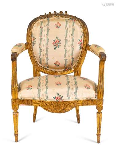 A Louis XVI Carved Giltwood Fauteuil Height 36 1/2 x
