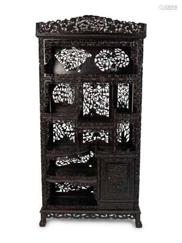 A Chinese Carved Hardwood Etagere Height 82 x width 40