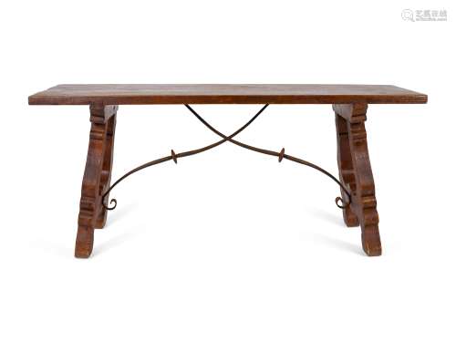 A Spanish Colonial Style Trestle Table With Wrought