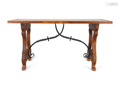 A Spanish Colonial Style Walnut Trestle Table with