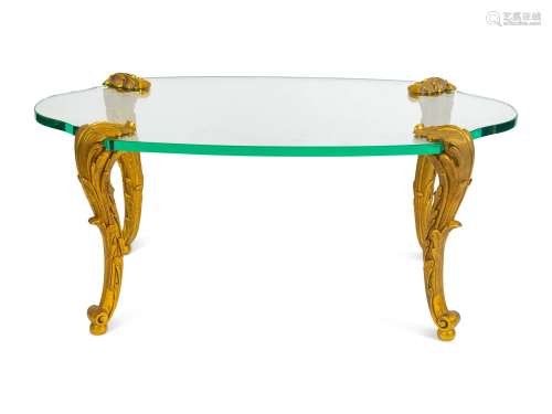 A Gilt Bronze and Turtle-form Glass Top Coffee Table by