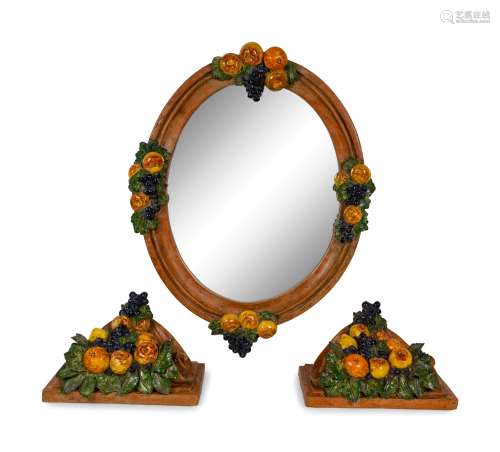 A Set of Italian Painted Terracotta Mirror and Wall
