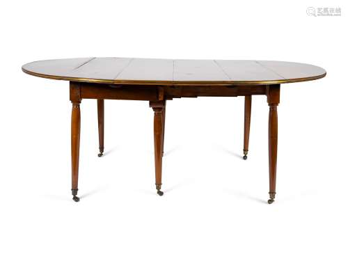 A Louis XVI Mahogany and Brass Banded Extension Dining