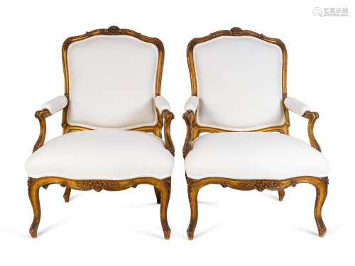 A Pair of Louis XV Giltwood Bergeres Height 42 x width