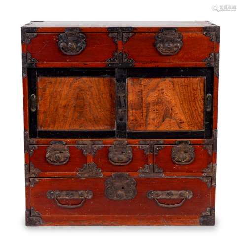 A Japanese Iron Mounted Red Stained Wood Tansu Height