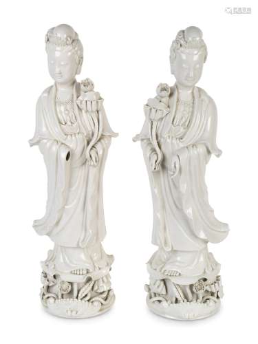 A Pair of Large White Glazed Porcelain Figures of
