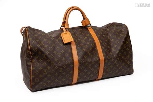 LOUIS VUITTON. Sac de voyage 