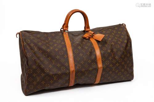 LOUIS VUITTON. Sac de voyage 