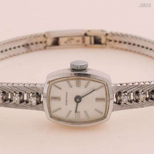 Montre en or blanc, 585/000, avec diamant. Montre de femme à...