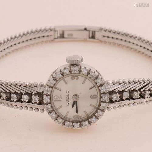 Montre en or blanc, 585/000, avec diamant. Montre de dame av...