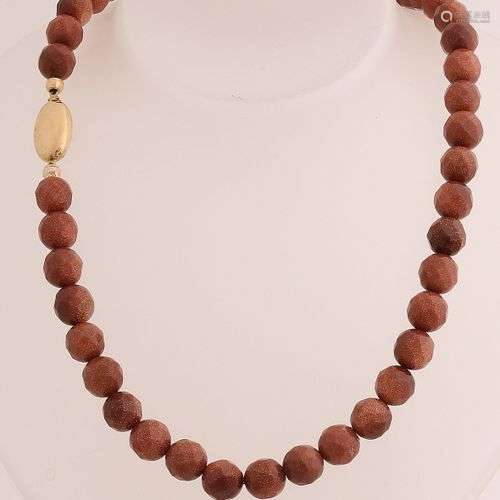 Collier de perles en goldstone facettées, ø 10mm, attachées ...