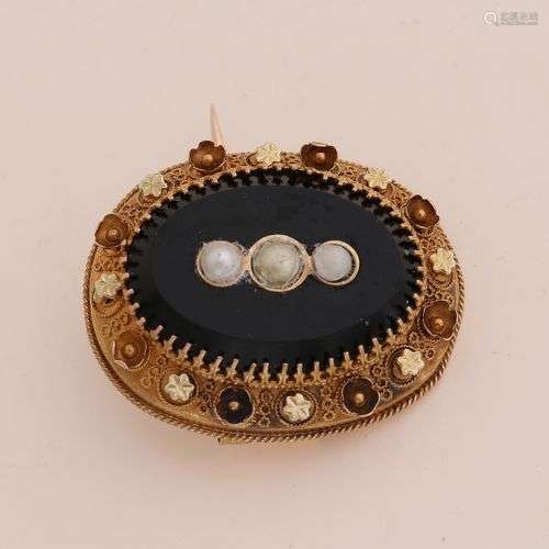 Broche en or jaune, 585/000, avec onyx et perle. Broche oval...