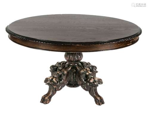 Table ovale en chêne français. Vers 1870. Pied avec sculptur...