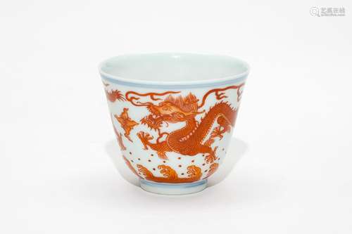 An Iron Red Dragon Cup with Daoguang Mark