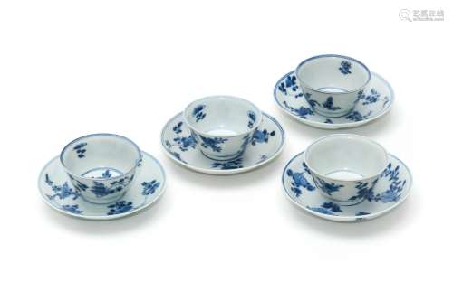 A Group of 4 Blue and White Floral Cups and Saucers