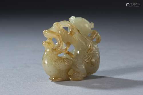 A Carved Hetian Jade Figure of Child and Goose