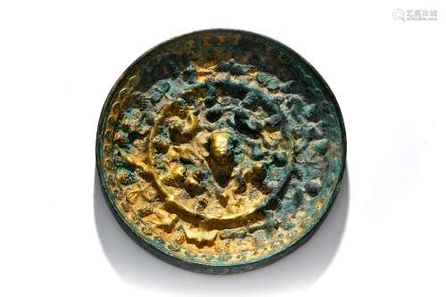 A Gilt Sea Beats and Grapes Bronze Mirror Tang Dynasty