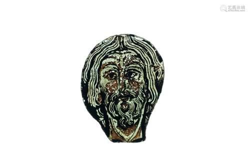 Un fragment roman en verre peint représentant le visage de C...