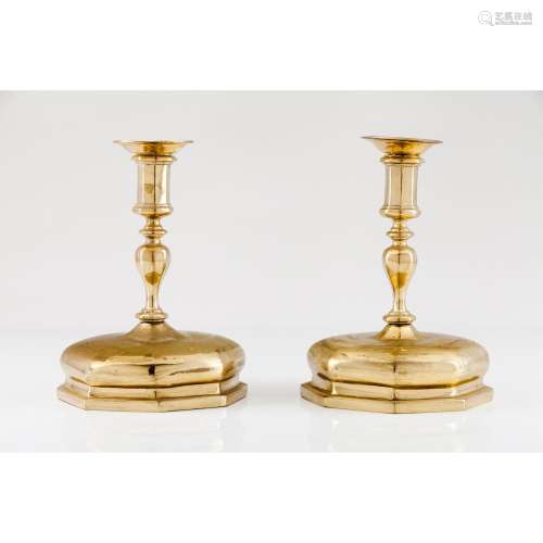 A pair of large candle stands