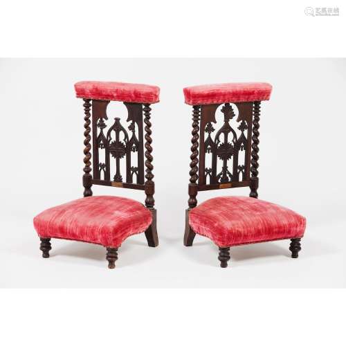 A pair of neogothic prayer chairs