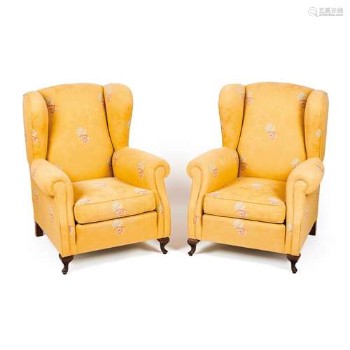 A pair of wingback armchairs