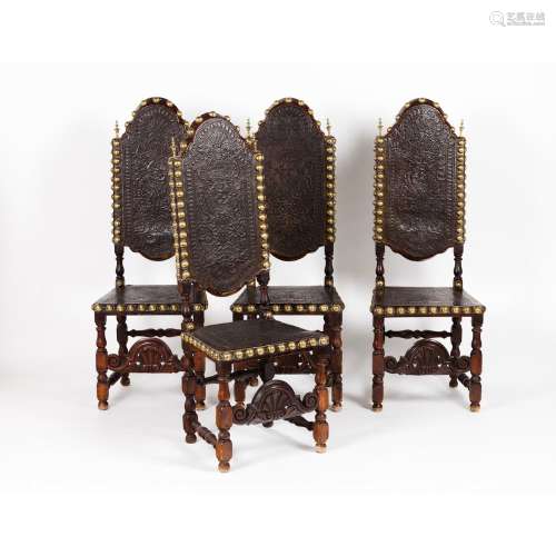 A set of four tall back chairs