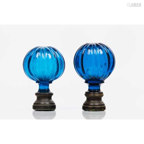 A set of two staircase finials